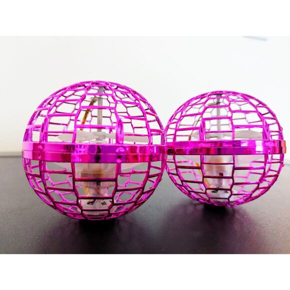 FLYNOVA Pink UFO Magic Flying Boomerang Drone for Kids Orb Ball Toy with Lights - Picture 6 of 7